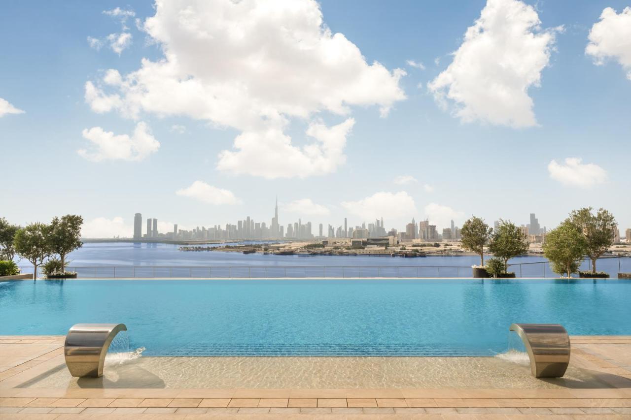 ホテル Address Creek Harbour ドバイ エクステリア 写真 View of Dubai from the pool