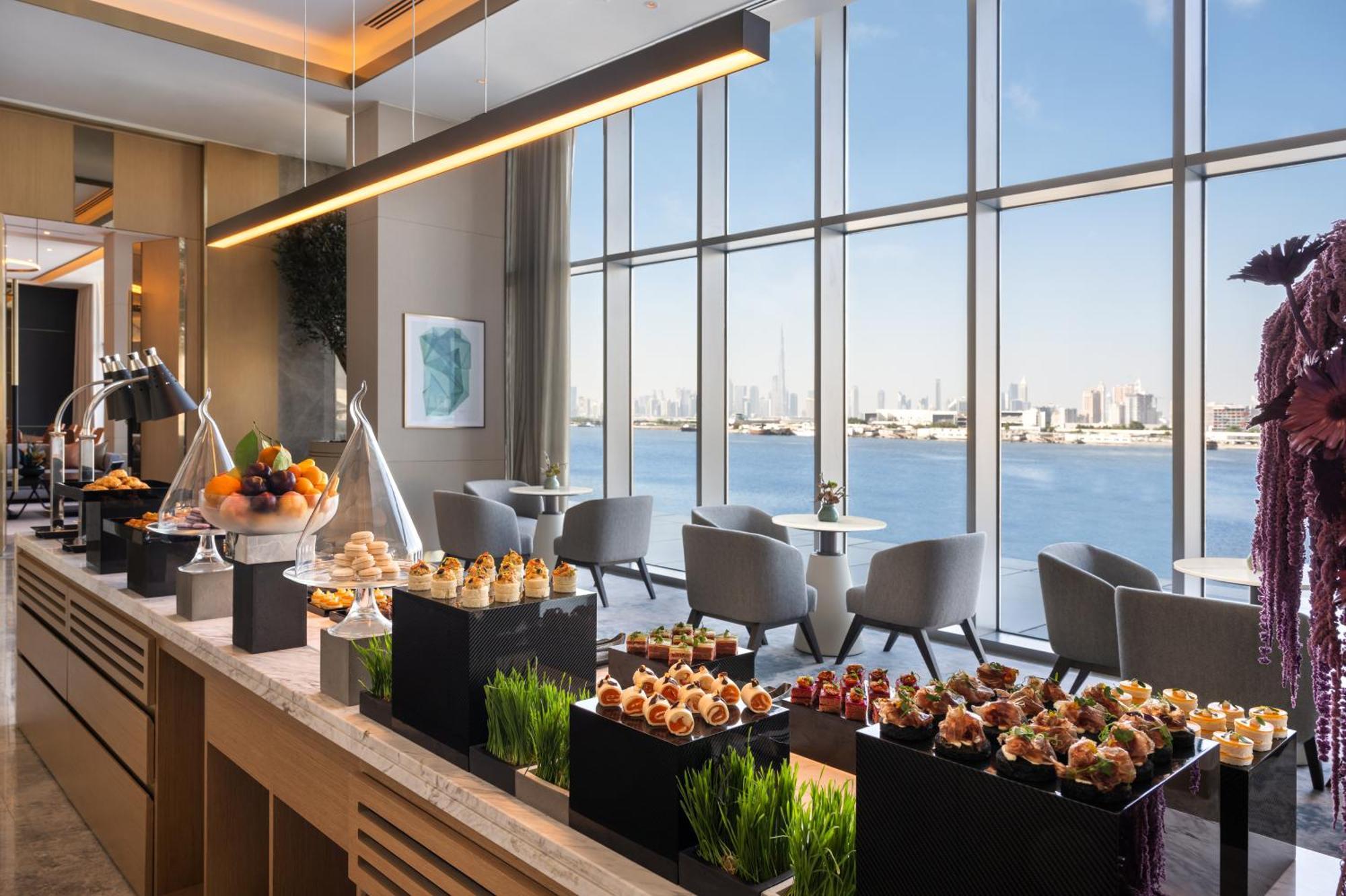 ホテル Address Creek Harbour ドバイ エクステリア 写真 The Lounge at the Jumeirah At Etihad Towers
